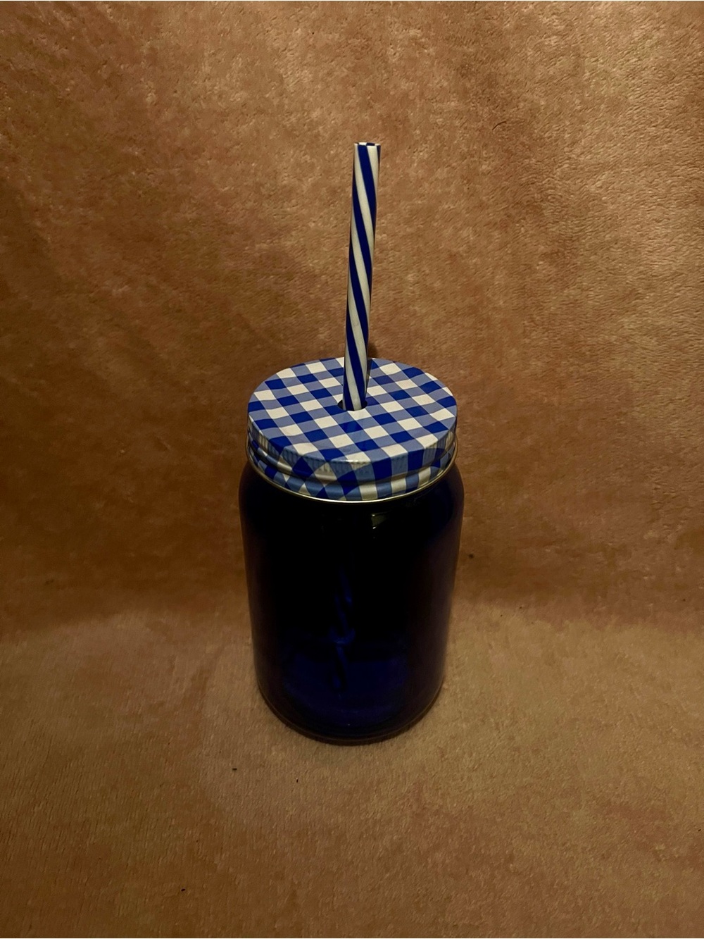 Blue Glass Mason-Style Jar with Gingham Lid and Striped Straw